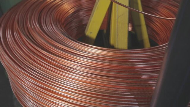 Copper cable spool rotation, copper cable manufacturing process