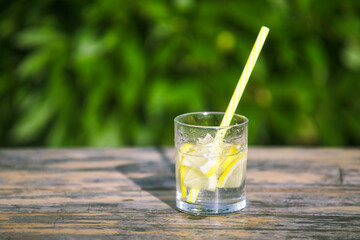 fresh lemonade lemonade. drinking straw in glass