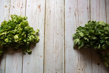 Bunch of leaves with use of selective focus on wooden background