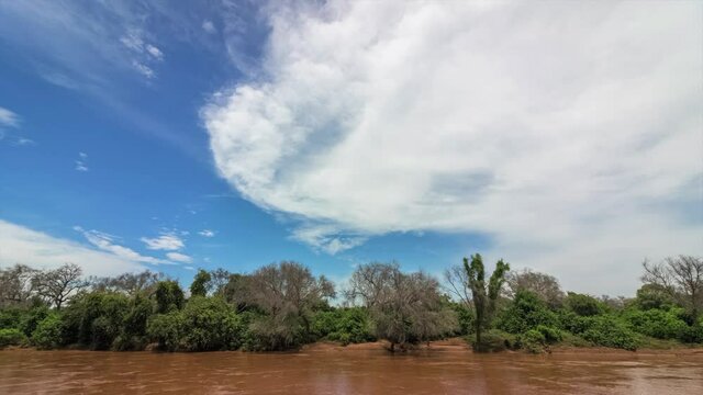 Fluffy cloud sky time-lapse over Mutale River at Makuleke Contractual Park