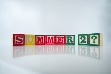 summer 2021 - letters made of wood isolated on white background
