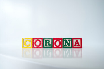 Corona in 3D letters made of wood