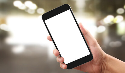 Hand holding smartphone device touching screen