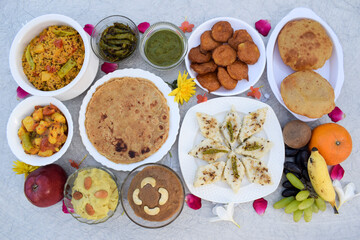 Farali vrat thaali homemade items Rajgira sheera, paratha, puri bhajiya or pakoda. Sabudanaflour white dhokla, sweetpotato dessert halwa, falahar mix fruits, mint chutney, chilly peanut pickle, bhagar