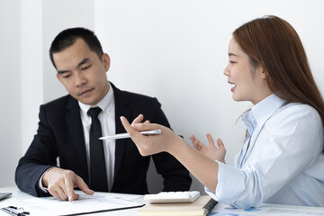 Brainstorm team, Marketers and financial accountants are discussing and analyzing charts to plan strategies to meet customer needs, Computer technology for business concept.