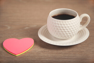 pink hearts on cup of coffee