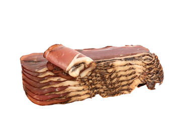 Sliced prosciutto strips isolated on white background. Close up. Copy space.