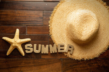 Summer related items on the wooden floor