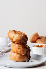 Yorkshire Puddings with condensed milk cream, lying on top of each other.