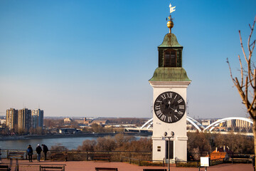 View from Petrovaradin fortress on the
right bank of the Danube river with
the Clock Tower in foreground. Novi Sad, Serbia.