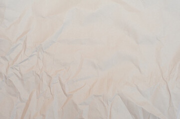 Crumpled paper texture. Light background 