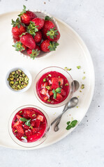 Malabi (muhallebi) milk pudding  with strawberries and pistachios.  Arabic desert