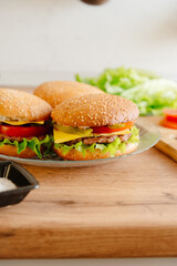 Homemade burgers. Burgers cooked at home kitchen.