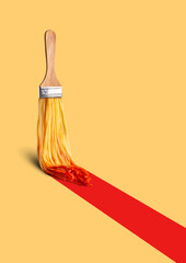 Photo collage of paint brush with spaghetti in red ketchup drawing long red bold stripe on light yellow background. Creative process, brainstorming, inspiration and imagination concept © somegirl