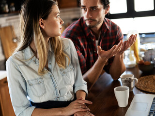 Boyfriend and girlfriend are arguing. Jealous girlfriend having an argument with her boyfriend
