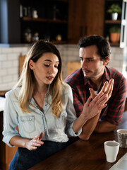 Boyfriend and girlfriend are arguing. Jealous girlfriend having an argument with her boyfriend