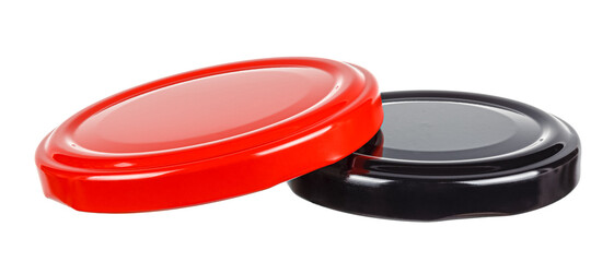 Black and red tin screw caps for glass jars isolated on white background