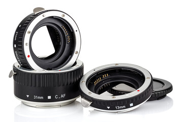 Extension rings for macro photography by DSLR camera isolated on white background