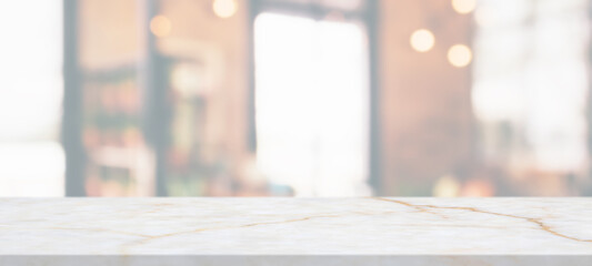 marble table top with blurred abstract cafe restaurant interior background