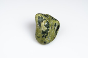 Natural stone green serpentine on a white background