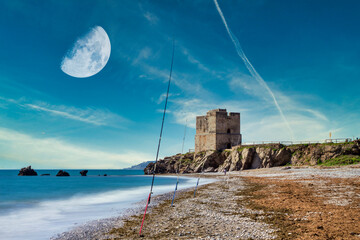 Fishing poles on the beach