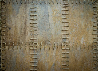 Brown box with seam, stitched frame pattern background