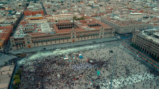 Orbital view of Mexico city Zocalo during womans day march