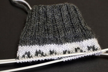 knitted black and white sock