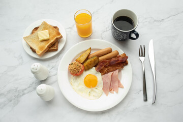 American and Thai breakfast set on the marble background