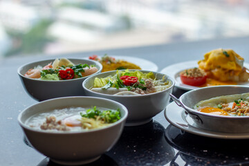 American and Thai breakfast set on the marble background
