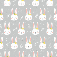 White rabbits seamless pattern. Cute characters with flowers and leaves.