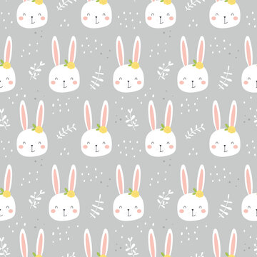 White rabbits seamless pattern. Cute characters with flowers and leaves.