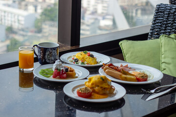 American and Thai breakfast set on the marble background