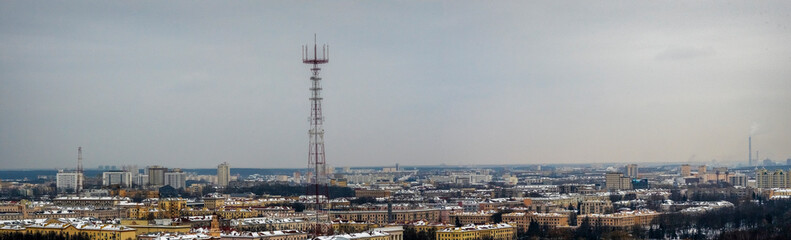 Panoramic view of TV tower and city in Minsk. Low Angle View Of Communications Tower Against Clear Sky. Space for text.