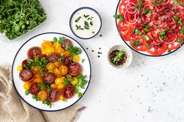 Fresh Salad with Colored Cherry Tomatoes and Herbs.	