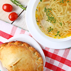 A bowl of healthy chicken noodle soup