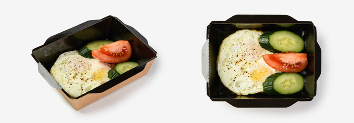scrambled eggs with vegetables in a paper container for a food delivery service.