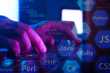 programming languages, software development concept, programmer coding on laptop