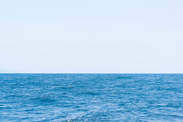 Obraz premium At sunset period, Tropical beach with Blue sky and clear sea. the summer beach to take a vacation period for relaxing.