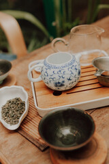 Woman serving Chinese tea in a tea ceremony.