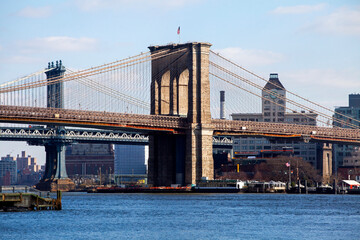 Fototapeta na wymiar Brooklyn bridge in New York, Usa. Sunny winter day
