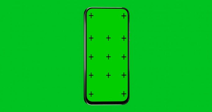 Rotation of the smartphone. Mobile phone with blank green screen, front view, isolated on green background. animation with camera track motion for presentation on mockup screen