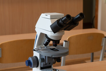 Microscope in the workroom on the table