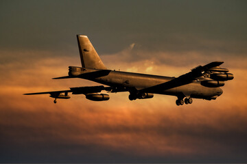 B52 Bomber. United States Air Force (USAF) B-52 heavy bomber landing at sunset