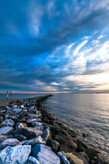 Fototapeta na wymiar dramatic sunrise landscape photo in Sandy Point State Park, Chesapeake Bay, Maryland.