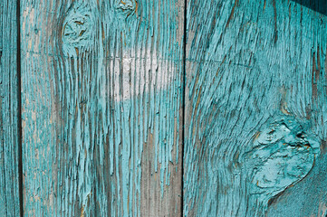Fototapeta na wymiar Old wall of wooden planks with paint cracked .
