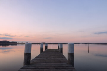 Romantic jetty at dawn as still life photography concept.