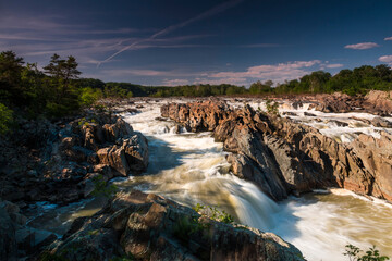 rushing rapids of the Potomac river in summer in Great Falls National Park in Maryland and Virginia.