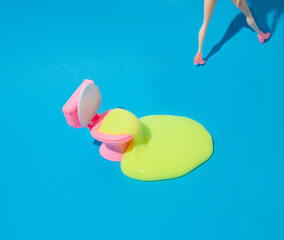 A woman who leaves after doing a big bowel movement and not cleaning up after herself. Pastel blue background. Minimal creative idea.