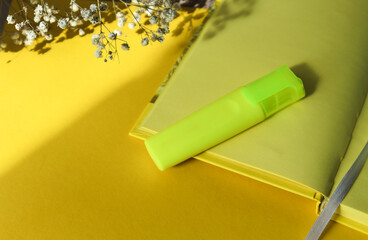 yellow notepad on a yellow background
